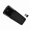 A black wireless mouse and a USB receiver on a white background. Náhľad obrázku produktu