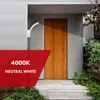 A modern entryway with a wooden door and a wall-mounted LED lamp. Anteprima dell’immagine prodotto