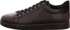 A side view of a black leather sneaker. Voir les images du produit