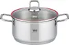 A stainless steel pot with a glass lid and red trim. Anteprima dell’immagine prodotto