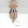 Fehn Mini boîte à musique 20 cm - Loutre Voir les images du produit 14