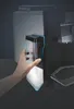 A hand is shown inserting a milk container into a coffee machine. Anteprima dell’immagine prodotto