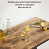 A close-up of a wooden table surface with drinks and a knife, with text overlay. Podgląd zdjęcia produktu