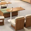 A cafe or restaurant setting with tables and seating. Produktbild-Vorschau