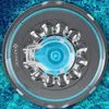 A robotic pool cleaner is shown floating on the surface of a swimming pool. Produktbild-Vorschau