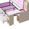 A close-up view of a white youth bed frame with integrated desk and storage components, featuring pink LED lighting. Podgląd zdjęcia produktu
