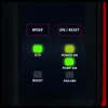Close-up of a control panel with indicator lights and buttons. Produktbild-Vorschau