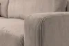 A close-up view of the armrest and seat of a corduroy sofa. Produktbild-Vorschau