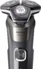 A close-up, studio shot of a Philips electric shaver. Náhled obrázku produktu