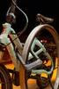 A close-up of a bicycle lock securing a bicycle to a bike rack. Produktbild-Vorschau