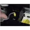 A hand is using a syringe with a tube to inject fluid into a printer component. Produktbild-Vorschau
