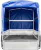 The rear view of an empty trailer with a blue tarp cover. Podgląd zdjęcia produktu
