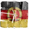 Wallario Design Wanduhr DDR Flagge auf altem Papier - Produktbild-Vorschau 1