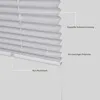 A close-up view of a light gray pleated blind, with dashed lines and text labels pointing to different parts of the product. Produktbild-Vorschau