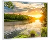 Wallario Wandbild Sonnenuntergang am Fluss in grüner Produktbild-Vorschau 2