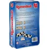 The image shows the back of a Rummikub Compact game tin. The tin displays product information, game examples, and branding. Náhľad obrázku produktu