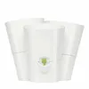 A white, three-part herb pot. Náhled obrázku produktu