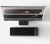 A top-down view of a silver and black Lofree Flow 2 68 wireless mechanical keyboard and its monitor. Produktbild-Vorschau