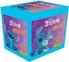 A blue box featuring Stitch from Disney's Lilo & Stitch, designed as a scrapbook with stickers. Produktbild-Vorschau