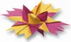 A folded paper star decoration, likely made from paper strips. Náhľad obrázku produktu
