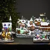 LED-Kirche 'Churchville' - 7 warmweiße LED - H: 18cm - weihnachtliche Dorfszene mit Drehbaum - bunt Podgląd zdjęcia produktu