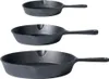 Three cast iron frying pans of different sizes are stacked vertically against a white background. Produktbild-Vorschau