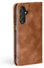 A close-up side view of a brown leather flip case for a smartphone, showing the camera module. Produktbild-Vorschau