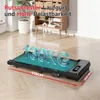 A black treadmill is shown on a wooden floor in a room with furniture in the background. Text overlays indicate features and dimensions. Produktbild-Vorschau