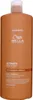 A bottle of Wella Ultimate Smooth Shampoo. Produktbild-Vorschau