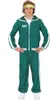 A person wearing a green tracksuit with white stripes and a yellow headband. Produktbild-Vorschau