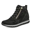 A black suede boot with a zipper and laces on a white background. Produktbild-Vorschau