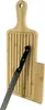 A bread cutting board with a serrated knife. Produktbild-Vorschau