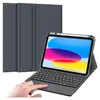 A tablet with a keyboard case and stylus is shown, with a hand interacting with the touchpad.