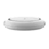 A white, round electronic device with a slightly raised center, shown from the side. Anteprima dell’immagine prodotto