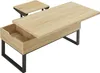 A light wood-effect coffee table with black metal legs, shown from a diagonal angle. Voir les images du produit