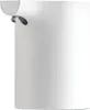 A close-up of a white automatic soap dispenser with a gray nozzle. Produktbild-Vorschau