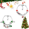 Christmas-themed charm bracelets and a decorated Christmas tree. Náhľad obrázku produktu