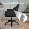 A black office chair is shown in a room with a desk and a plant. An inset diagram highlights the ergonomic design of the chair. Voir les images du produit