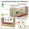A marketing image showcasing a wooden planter box with various plants, climbing vines, and decorative elements, highlighting its features and versatility. Produktbild-Vorschau