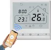 A smart thermostat is shown with a smartphone displaying its interface. Voir les images du produit