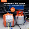 A VEVOR recovery tank with nitrogen and a recovery machine are set up in front of a car. Podgląd zdjęcia produktu