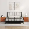 A bedroom scene with a bed and two nightstands. Produktbild-Vorschau