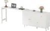 A white L-shaped desk with a cabinet and drawers, shown against a white background. Anteprima dell’immagine prodotto