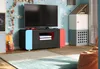 A gaming lowboard with a TV on top, in a child's room with themed wallpaper and decorations. Produktbild-Vorschau