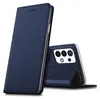 A dark blue flip case for a smartphone is shown, with the phone partially visible inside the case. Náhľad obrázku produktu