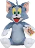 A plush toy of the cartoon character Tom from Tom and Jerry, sitting and holding a small tag. Náhľad obrázku produktu
