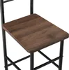 Close-up of a wooden stool seat with black metal legs. Anteprima dell’immagine prodotto