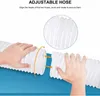 Hands connecting two sections of a white, flexible hose. Produktbild-Vorschau