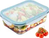 A glass food storage container filled with salad, with a few cherry tomatoes in the foreground. Anteprima dell’immagine prodotto