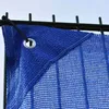 A close-up view of a blue construction fence net attached to a dark metal fence. Produktbild-Vorschau